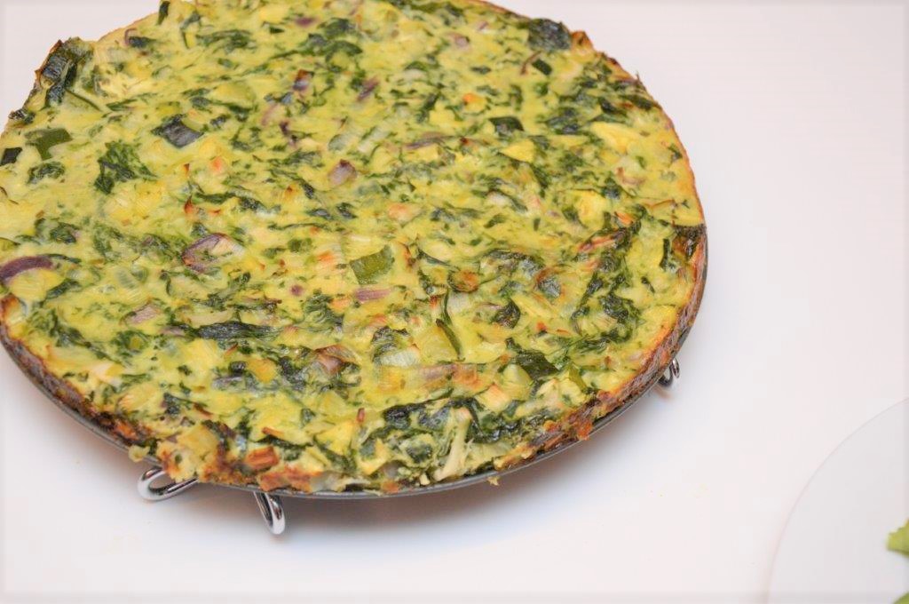 bodemloze quiche met spinazie, prei en courgette